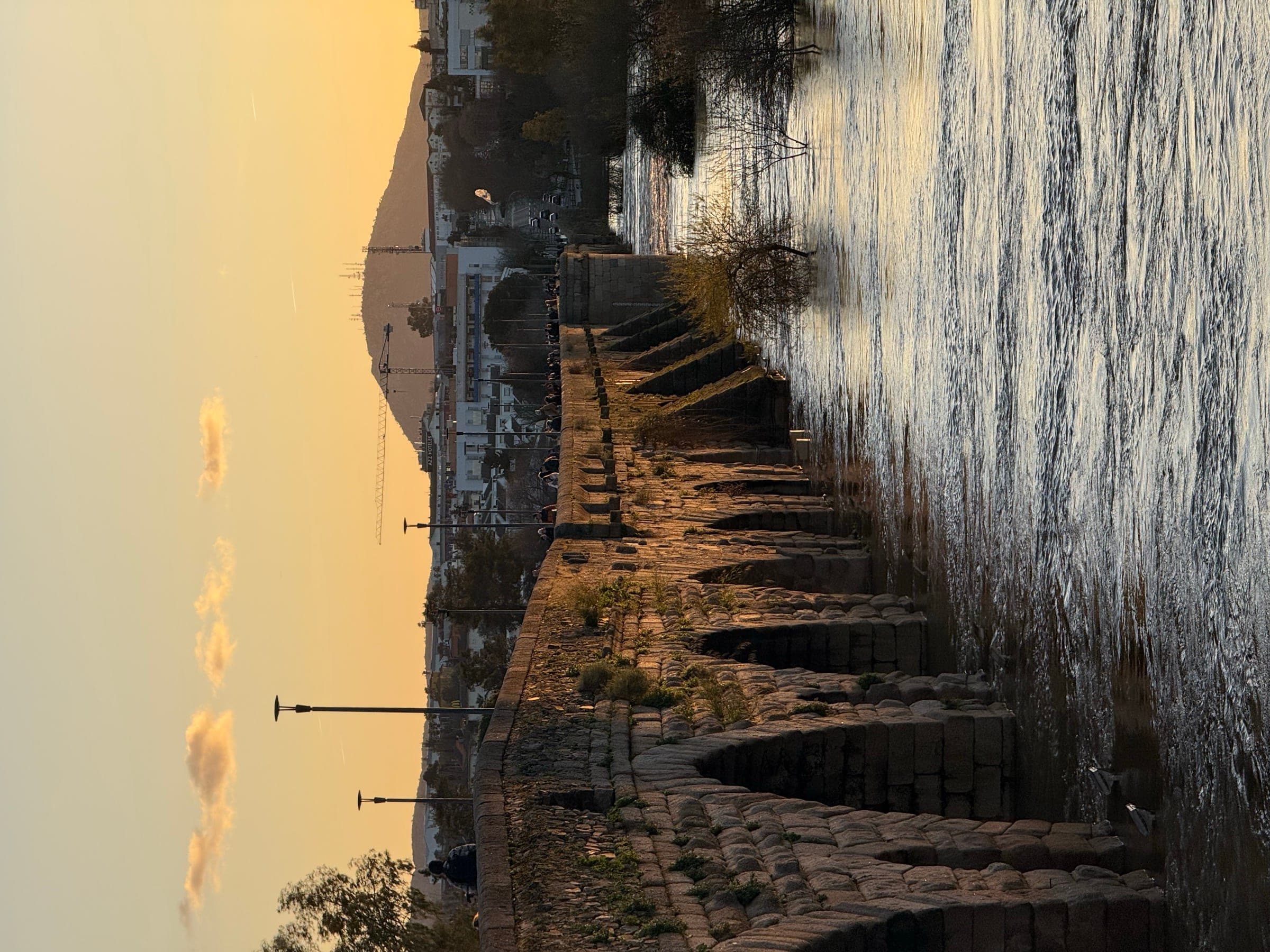 The Roman bridge of Mérida crossing the Guadiana in late afternoon.